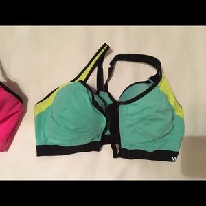 Snap and zip sports bras